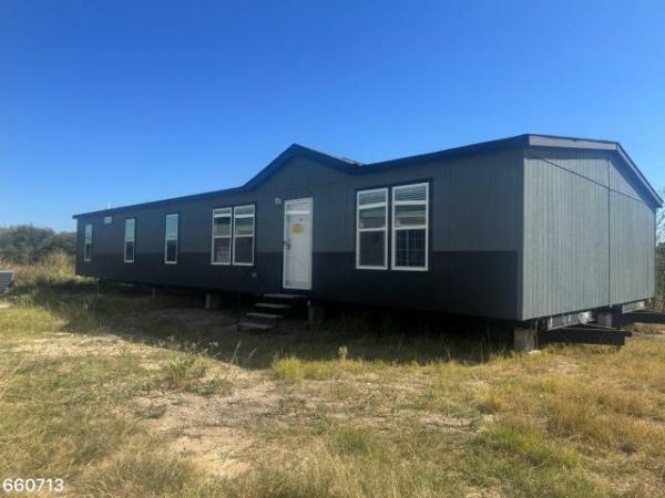 Photo 1 of 2 of home located at Cowboy Capital Cottages 4014 Hwy 16 South Bandera, TX 78003