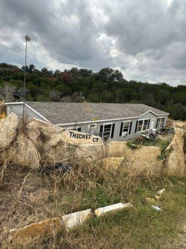 Photo 1 of 2 of home located at 1209 Thicket Ct Granbury, TX 76048