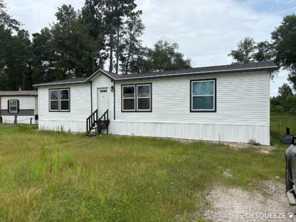 Photo 1 of 2 of home located at Greater Texas Home Buyers Llc 7770 Us Hwy 59 Goodrich, TX 77335