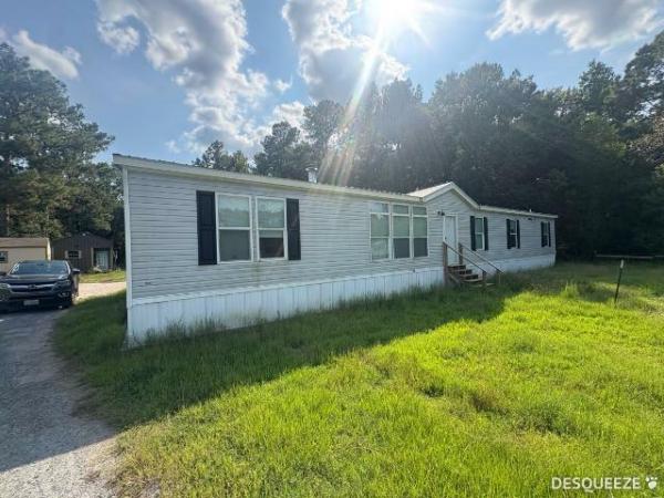 Photo 1 of 2 of home located at Milford Enterprise Inc. 8652 Us Highway 96 N Brookeland, TX 75931