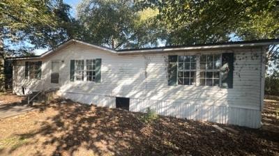 Photo 2 of 14 of home located at 210 E San Francisco Black Oak, AR 72414