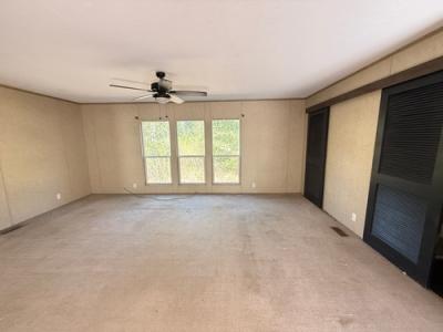 Photo 4 of 13 of home located at 2324 County Road 2134 Cleveland, TX 77327