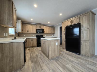 Photo 3 of 13 of home located at 7204 East Grand River Ave Lot 391 Portland, MI 48875