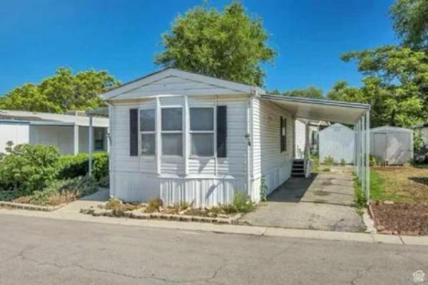 Photo 1 of 2 of home located at Meadowbrook Village 3951 S Warbler St Salt Lake City, UT 84123