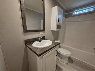 Photo 2 of 11 of home located at 291 Woods Court Flint, MI 48506