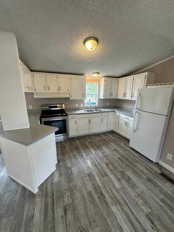 1997 CAVCO ES-6016C Mobile Home