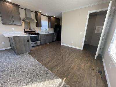 Photo 5 of 25 of home located at 38054 Versailles #62 Clinton Township, MI 48038