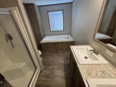 Photo 5 of 9 of home located at 10050 S Xavier St Conroe, TX 77303