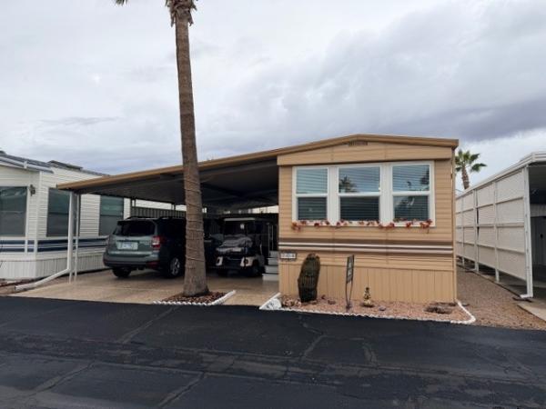 Photo 1 of 2 of home located at 400 N. Plaza Drive Lot #704 Apache Junction, AZ 85120