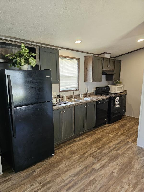 Photo 1 of 2 of home located at 2201 E. Macarthur Rd. Lot F-21 Wichita, Ks 67216 Wichita, KS 67216