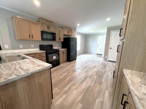 Photo 1 of 2 of home located at 6588 North Hampshire Drive Lot 302 Holly, MI 48442