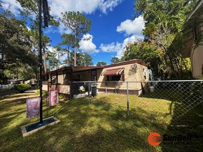 Photo 3 of 54 of home located at 13582 E Hwy 40 Lot 157 Silver Springs, FL 34488