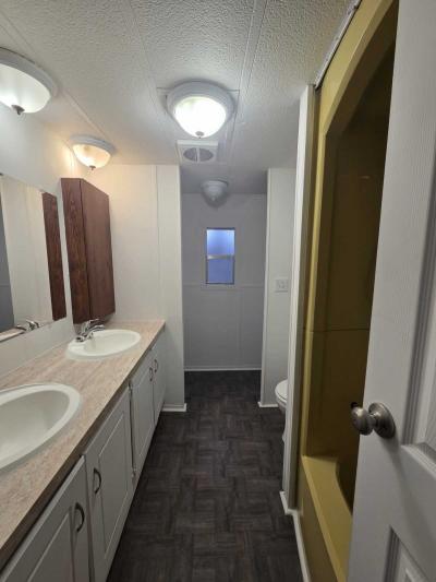 Photo 4 of 6 of home located at 3328 Jay St Wixom, MI 48393