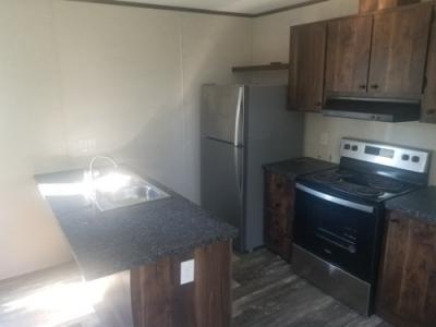 Photo 5 of 14 of home located at 128 Ouachita Cir Donaldson, AR 71941