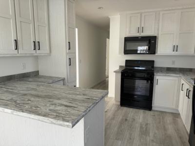 Photo 5 of 11 of home located at 4041 Grange Hall Rd #26 Holly, MI 48442