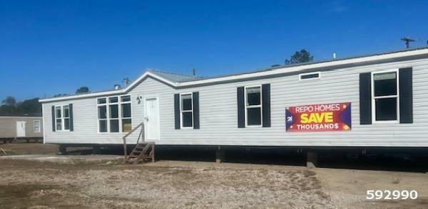 Photo 1 of 2 of home located at Milford Enterprise Inc. 8652 Us Highway 96 N Brookeland, TX 75931