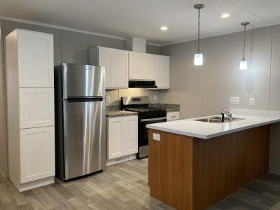 Photo 2 of 10 of home located at 32 Camelot Lane, Site #  63 Rice Lake, WI 54868