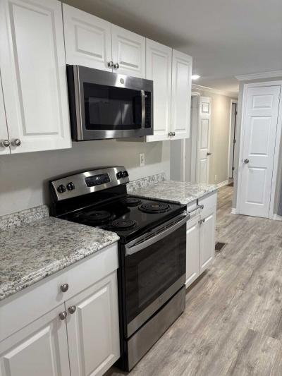 Photo 4 of 11 of home located at 37945 Bentley Drive Lot 110 Zephyrhills, FL 33542