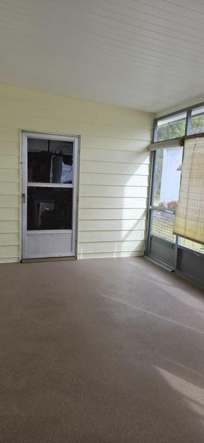 Photo 3 of 22 of home located at 15130 Timber Village Rd Lot 87 Groveland, FL 34736