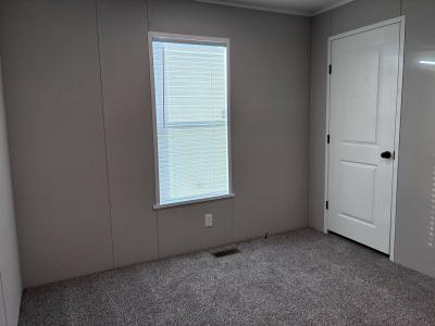 Photo 3 of 10 of home located at 216 Norman Dr Highland, MI 48357