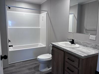 Photo 4 of 10 of home located at 216 Norman Dr Highland, MI 48357