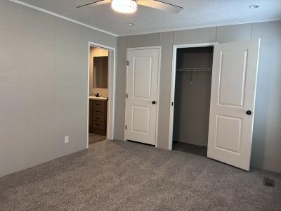 Photo 5 of 10 of home located at 216 Norman Dr Highland, MI 48357