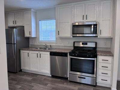 Photo 5 of 7 of home located at 16 E Grant Ct Highland, MI 48357