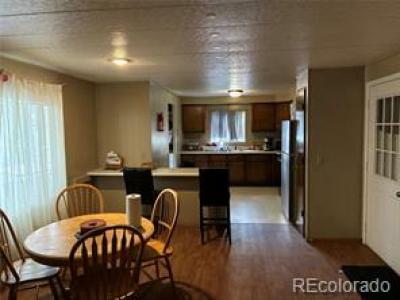 Photo 4 of 8 of home located at 1838 Cimarron St Aurora, CO 80111