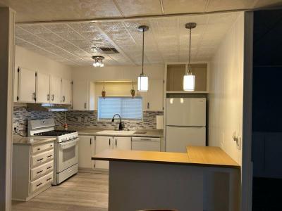 Photo 6 of 25 of home located at 10701 N. 99th Ave. Lot 176 Peoria, AZ 85345