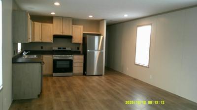 Photo 4 of 11 of home located at 17389 Oak Grove Brownstown, MI 48174