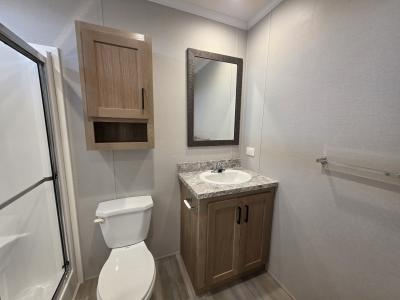 Photo 5 of 7 of home located at 264 W Glengarry Ct Highland, MI 48357