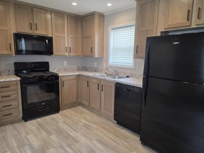 Photo 2 of 7 of home located at 264 W Glengarry Ct Highland, MI 48357