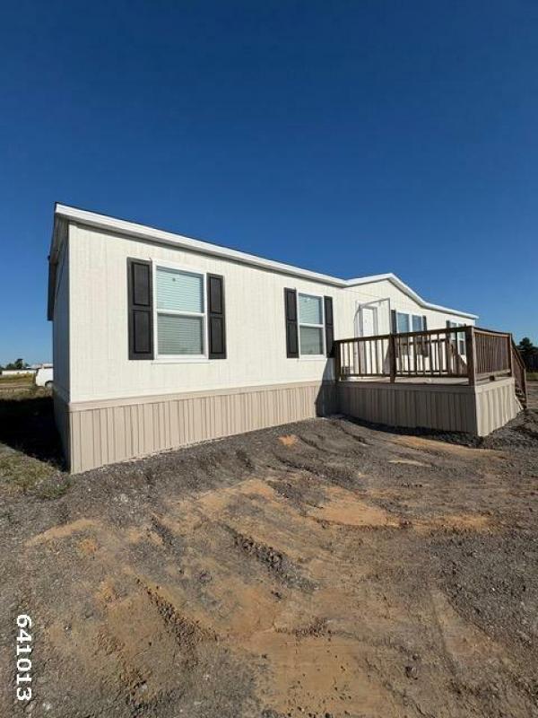 Photo 1 of 2 of home located at Greater Texas Home Buyers Llc 7770 Us Hwy 59 Goodrich, TX 77335