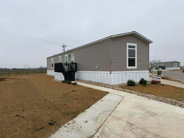 Photo 1 of 2 of home located at 129 Ponderosa Way #Pond129 Sanger, TX 76266