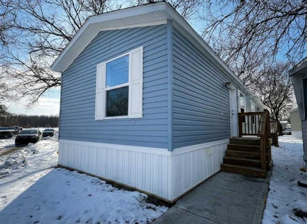 Photo 1 of 1 of home located at 1145 Harmonia Rd. Lot 57 Springfield, MI 49037