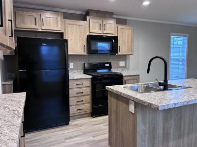 Photo 3 of 10 of home located at 2242 Maclaren Dr Highland, MI 48357