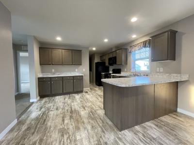 Photo 2 of 10 of home located at 7204 East Grand River Ave Lot 384 Portland, MI 48875