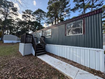 Mobile Home at 1420 Hill Pine Huntsville, TX 77340