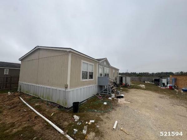 Photo 1 of 2 of home located at Greater Texas Home Buyers Llc 7770 Us Hwy 59 Goodrich, TX 77335