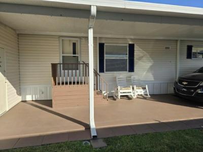 Photo 2 of 19 of home located at 30 Ricks Dr. Greenacres, FL 33463