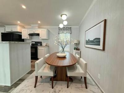 Photo 5 of 22 of home located at 13618 N. Florida Avenue Lot #64 Tampa, FL 33613