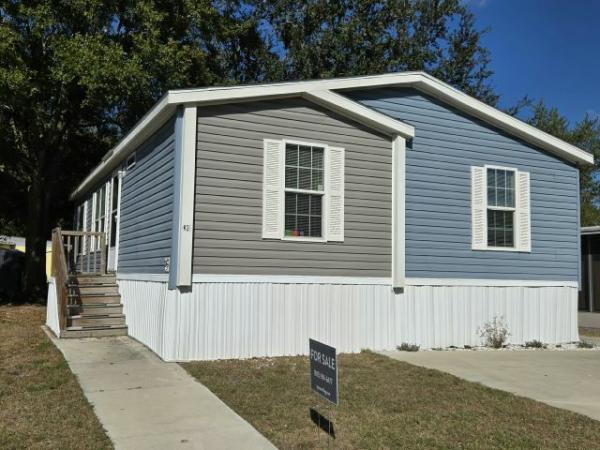Photo 1 of 2 of home located at 13618 N. Florida Avenue Lot #42 Tampa, FL 33613