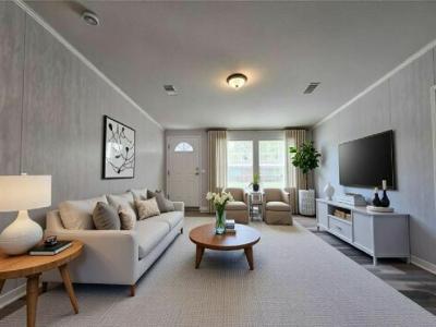 Photo 2 of 14 of home located at 13618 N. Florida Avenue Lot #42 Tampa, FL 33613