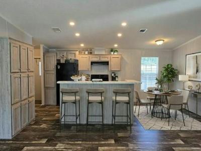 Photo 3 of 14 of home located at 13618 N. Florida Avenue Lot #42 Tampa, FL 33613