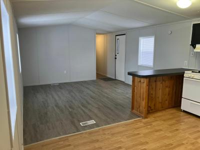 Photo 5 of 9 of home located at 113 Tilltag Drive, Site # 52 Balsam Lake, WI 54810