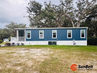 Photo 3 of 55 of home located at 3605 Umbrella Tree Lane Oxford, FL 34484