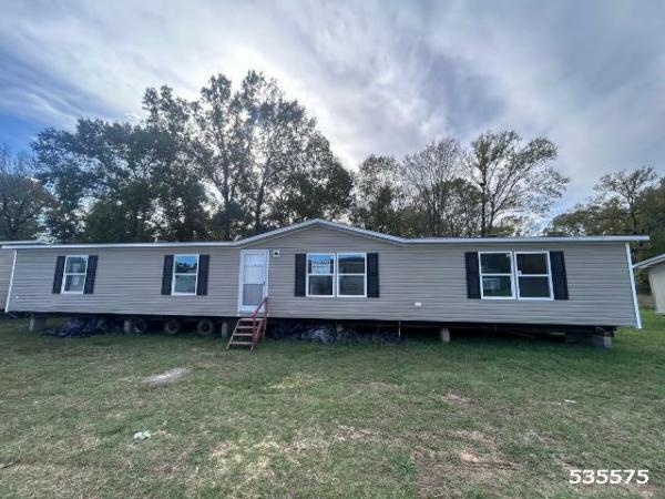 Photo 1 of 2 of home located at Greater Texas Home Buyers Llc 7770 Us Hwy 59 Goodrich, TX 77335