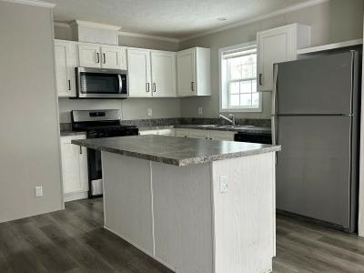 Photo 4 of 25 of home located at 4418 Daisy Lane #156 Traverse City, MI 49685