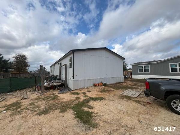Photo 1 of 2 of home located at Greater Texas Home Buyers Llc 7770 Us Hwy 59 Goodrich, TX 77335