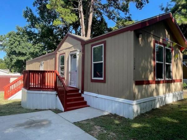 Photo 1 of 2 of home located at 132 Sara Lane Huntsville, TX 77340